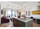 Open-concept kitchen with a large island, modern appliances, and stunning city views at 2233 Peachtree Ne Rd # 1207, Atlanta, GA 30309