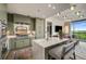 Modern kitchen with stainless steel appliances, marble countertops, island, and seating area at 2233 Peachtree Ne Rd # 1207, Atlanta, GA 30309