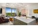 Open-concept living space with modern kitchen, island seating, and expansive views from floor-to-ceiling windows at 2233 Peachtree Ne Rd # 1207, Atlanta, GA 30309