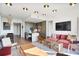 Bright, open-concept living area features a kitchen island, modern lighting, and stylish furnishings at 2233 Peachtree Ne Rd # 1207, Atlanta, GA 30309