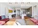 A spacious living room with modern décor seamlessly flows into a well-equipped kitchen area at 2233 Peachtree Ne Rd # 1207, Atlanta, GA 30309
