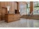 Welcoming lobby features wood paneling, marble floors, and concierge desk at 2233 Peachtree Ne Rd # 1207, Atlanta, GA 30309