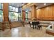 Elegant lobby with a grand piano, staircase, and comfortable seating area at 2233 Peachtree Ne Rd # 1207, Atlanta, GA 30309