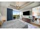 This main bedroom boasts a tray ceiling, recessed lighting and a private balcony with an amazing view at 2233 Peachtree Ne Rd # 1207, Atlanta, GA 30309