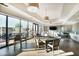 The resident's lounge has lots of natural light, a lounging area and tables for gathering at 2233 Peachtree Ne Rd # 1207, Atlanta, GA 30309