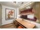 Bright home office features modern artwork, desk space, and wood flooring at 2233 Peachtree Ne Rd # 1207, Atlanta, GA 30309