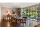 Dining room with hardwood floors, large windows, and contemporary decor at 3489 Knollwood Nw Dr, Atlanta, GA 30305
