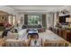 Bright living room with large window, neutral colors, and stylish furnishings at 3489 Knollwood Nw Dr, Atlanta, GA 30305