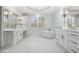 Luxurious bathroom boasts double vanities, a soaking tub, and stylish fixtures at 3707 Peachtree Ne Rd # 8, Atlanta, GA 30319