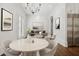 Bright living and dining room features modern decor, hardwood floors and stylish accents at 3707 Peachtree Ne Rd # 8, Atlanta, GA 30319