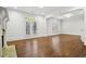 Bright living room features hardwood floors, fireplace, french doors and ample natural light at 3707 Peachtree Ne Rd # 8, Atlanta, GA 30319