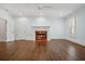Spacious living room with a charming fireplace, hardwood floors, and ample natural light at 3707 Peachtree Ne Rd # 8, Atlanta, GA 30319