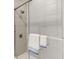 Modern shower featuring glass enclosure and shower head at 3707 Peachtree Ne Rd # 8, Atlanta, GA 30319