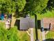 Aerial view of the property showing the roof, driveway, and surrounding trees at 6703 Cameron Rd, Morrow, GA 30260