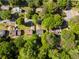 Aerial view of the property nestled among lush trees and neighboring homes at 6703 Cameron Rd, Morrow, GA 30260