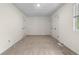 Neutral bedroom with carpet and two white doors at 6703 Cameron Rd, Morrow, GA 30260