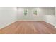 Spacious bedroom with hardwood flooring and two windows for natural light at 6703 Cameron Rd, Morrow, GA 30260