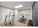 Basement gym featuring workout equipment and a chalkboard wall for personal training at 840 Whitby Dr, Douglasville, GA 30134