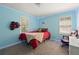 Cozy bedroom featuring carpet flooring, ample lighting, and ceiling accents at 840 Whitby Dr, Douglasville, GA 30134