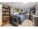 Bedroom decorated with memorabilia and featuring a comfortable bed and ample storage at 840 Whitby Dr, Douglasville, GA 30134