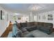 Basement with large sectional couch and workout area at 2562 Red Valley Rd, Atlanta, GA 30305