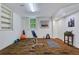Basement workout room with gym equipment and wood look floors at 2562 Red Valley Rd, Atlanta, GA 30305