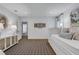 A cozy bedroom featuring a daybed, hardwood floors, and stylish furnishings at 2562 Red Valley Rd, Atlanta, GA 30305