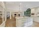 Large kitchen island with bar seating connects the kitchen and Gathering room at 2562 Red Valley Rd, Atlanta, GA 30305