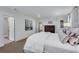 Bright main bedroom featuring a comfortable bed, hardwood floors, and plenty of natural light at 2562 Red Valley Rd, Atlanta, GA 30305