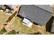 This is an aerial view of the home's backyard, patio, and well-maintained roof at 4175 Round Stone Dr, Snellville, GA 30039