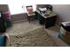 Bedroom with carpet, a window, and desk with chair at 4175 Round Stone Dr, Snellville, GA 30039
