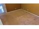 Neutral bedroom with beige carpet and a brown accent wall at 4175 Round Stone Dr, Snellville, GA 30039