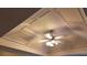 Detailed ceiling with intricate trim work and a classic ceiling fan adding architectural interest to the room at 4175 Round Stone Dr, Snellville, GA 30039