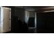 Garage interior with a door and open garage door, offering ample space for storage or parking at 4175 Round Stone Dr, Snellville, GA 30039