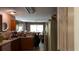 Bright kitchen area featuring modern appliances, a refrigerator, and plenty of cabinet space at 4175 Round Stone Dr, Snellville, GA 30039