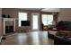 Bright living room featuring hardwood floors and a fireplace at 4175 Round Stone Dr, Snellville, GA 30039