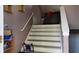 View of a staircase leading to the upper level of the home at 4175 Round Stone Dr, Snellville, GA 30039