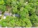 Aerial view of the home nestled among lush greenery, showcasing its private and serene setting at 230 Summerfield Dr, Alpharetta, GA 30022