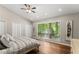 Bright bedroom with hardwood floors, large windows, and ample closet space at 230 Summerfield Dr, Alpharetta, GA 30022