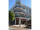 Beautiful multi-story building with wrought iron balconies and street-level retail at 230 Summerfield Dr, Alpharetta, GA 30022