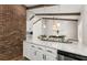 Beautiful kitchen with a marble countertop, modern appliances, and dining area at 230 Summerfield Dr, Alpharetta, GA 30022
