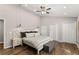 Comfortable bedroom featuring recessed lighting, pendant lights, and ample closet space at 230 Summerfield Dr, Alpharetta, GA 30022