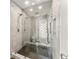 Elegant glass shower with stylish tile work and modern fixtures at 230 Summerfield Dr, Alpharetta, GA 30022