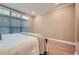 Bedroom with neutral paint, natural light from large window, and minimal decor at 2700 Pine Tree Ne Rd # 4003, Atlanta, GA 30324