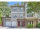 Charming multi-Gathering townhouse with well-maintained landscaping and attached garages at 2700 Pine Tree Ne Rd # 4003, Atlanta, GA 30324