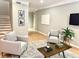 Living room featuring neutral tones, cozy seating, and stylish decor, enhancing the inviting ambiance at 2700 Pine Tree Ne Rd # 4003, Atlanta, GA 30324