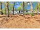 Inviting single-story home nestled among mature trees, offering shade and curb appeal at 3795 Willowbrook Dr, Douglasville, GA 30135