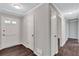 Hallway featuring closet space, a door to the outside, and access to other rooms at 3795 Willowbrook Dr, Douglasville, GA 30135