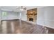 Bright living room with a stone fireplace and laminate flooring at 3795 Willowbrook Dr, Douglasville, GA 30135