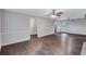 Spacious living room featuring laminate flooring and neutral wall color at 3795 Willowbrook Dr, Douglasville, GA 30135
